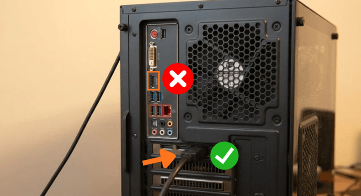 Podłączenie przewodu HDMI do gniazda karty graficznej z tyłu komputera
